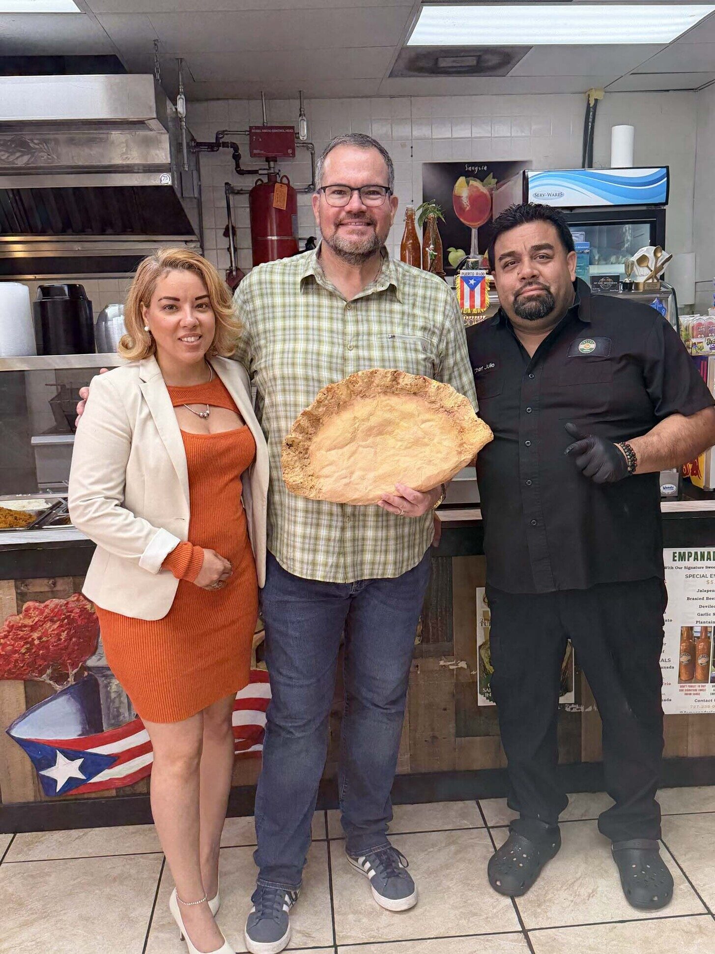 Julio and his team behind the counter in the Gulfport restaurant
